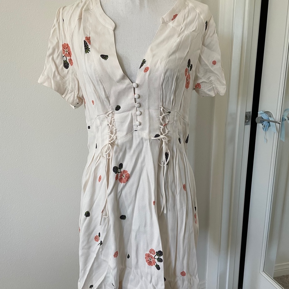 White mini dress with blackberry/floral print